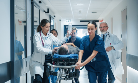Medical team rushing patient on stretcher