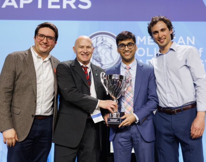 Physicians receiving medical excellence award