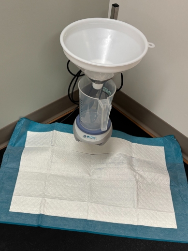 Uroflow machine for urinary flow testing