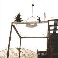 Worker topping off a roof